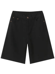 Black textured denim bermuda shorts with a wide leg and casual fit.