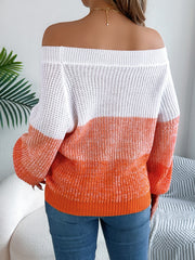 Off-shoulder knit sweater with colorblock white and orange, balloon sleeves.