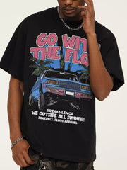 Black cotton graphic tee with vintage car and palm tree print.