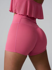 Deep Pink active shorts with sculpted pocket detail and high waist