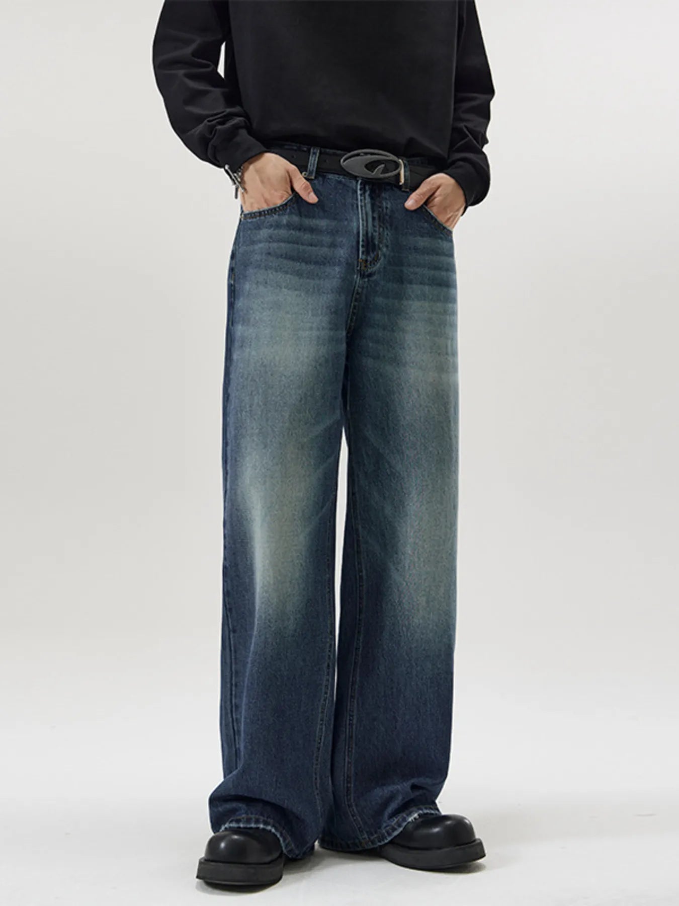 Men's wide-leg wash denim jeans in French Blue with a relaxed fit.
