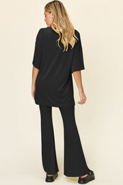 Black oversized tee and flare leg pants set, casual outfit