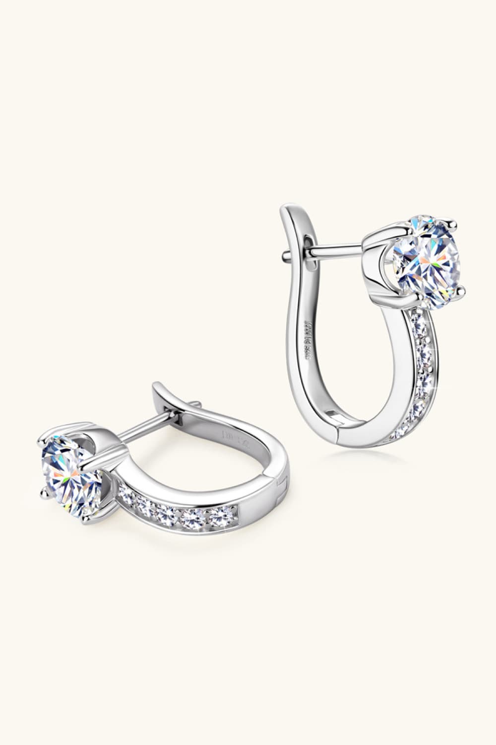 Silver pavé and solitaire hoop earrings with clear stones