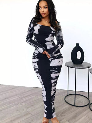 Black and white tie-dye maxi dress with long sleeves and square neckline.
