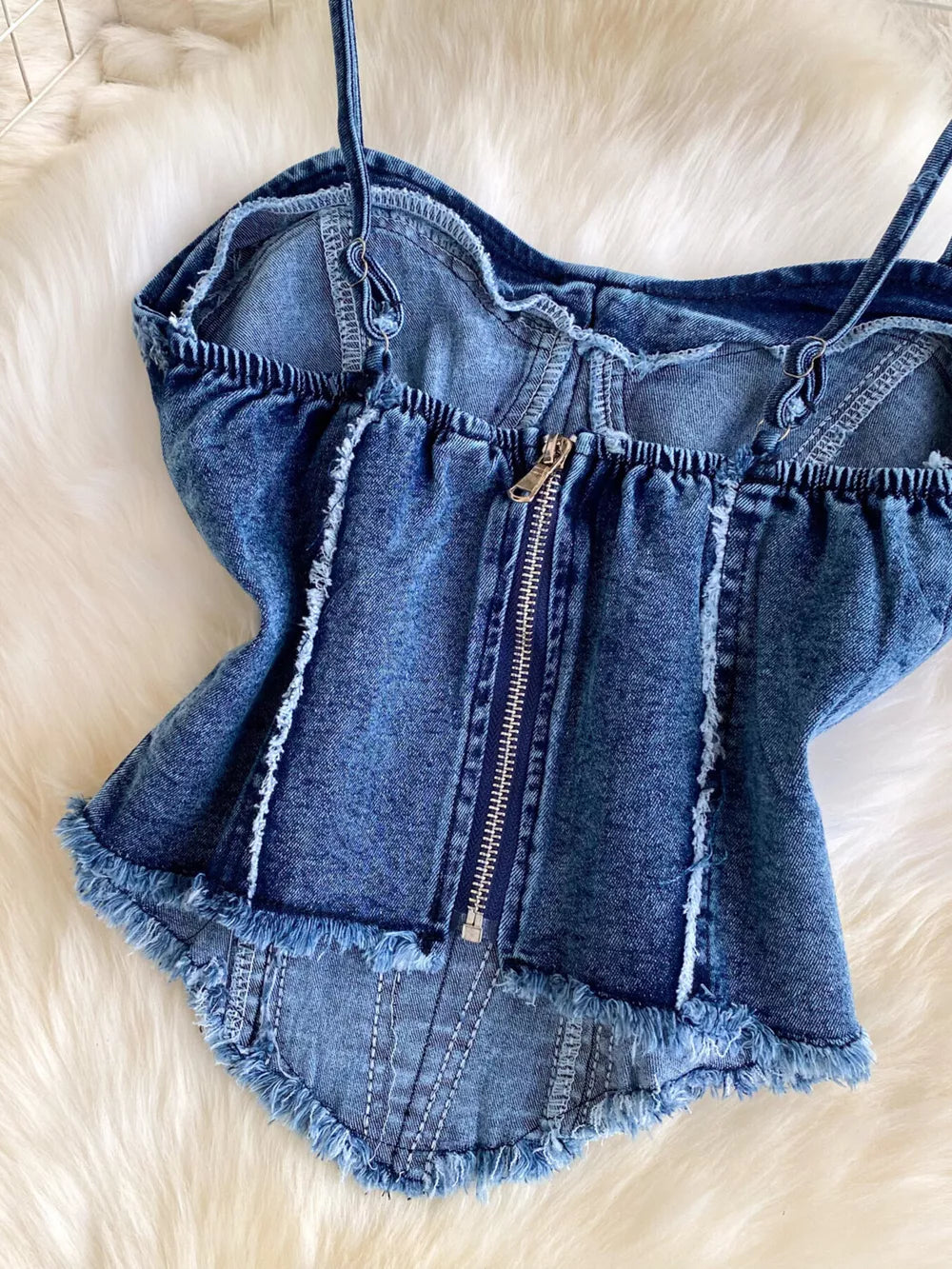 Denim cami with raw hem and front zipper detail
