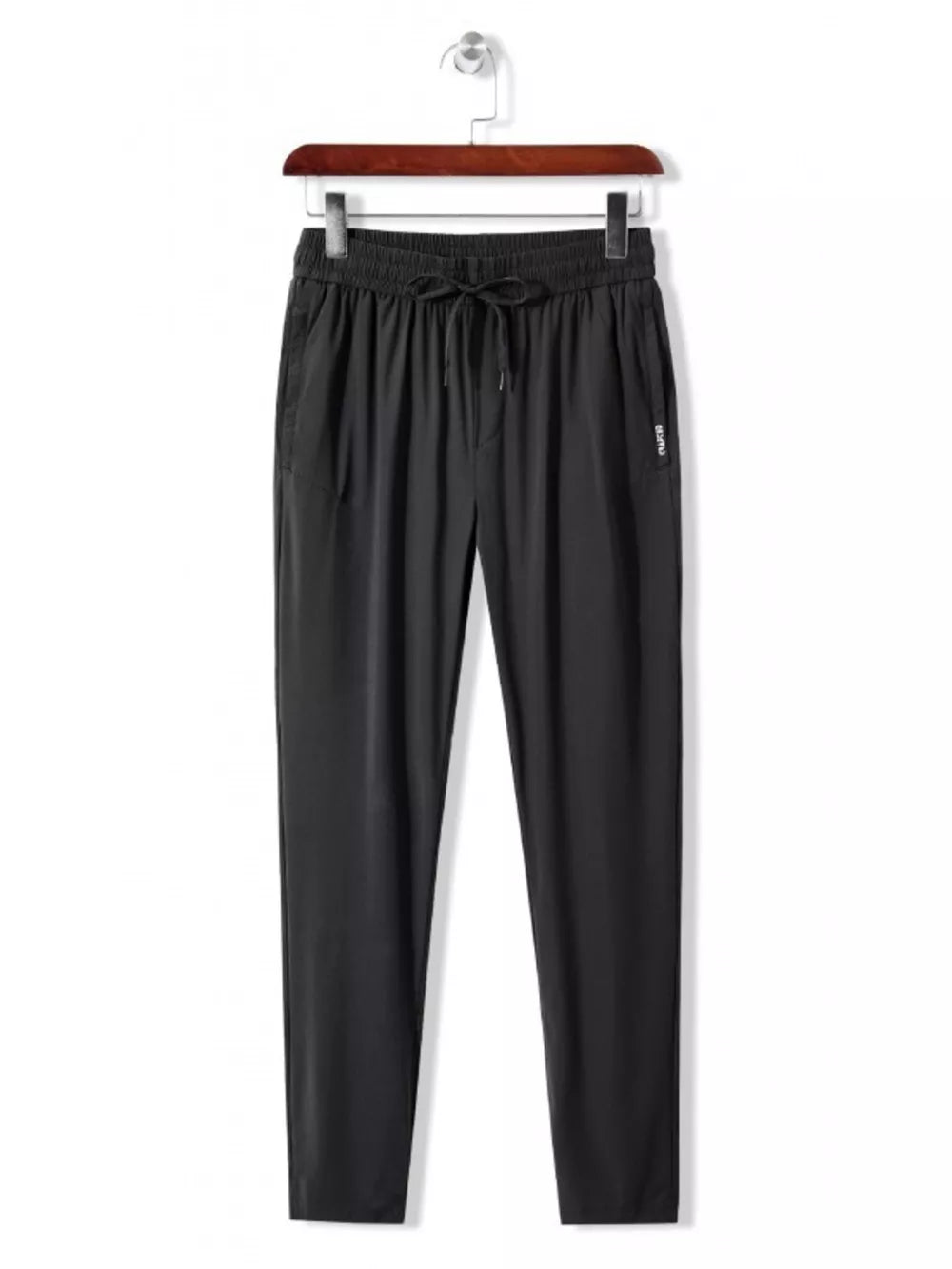 Men's black drawstring active pants with side logo detail.