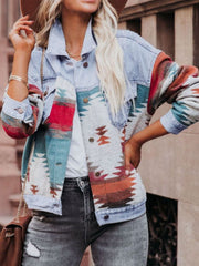 Light blue denim jacket with Aztec print sleeves and panels, buttoned front.