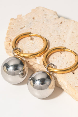 Gold hoop earrings with silver sphere drops
