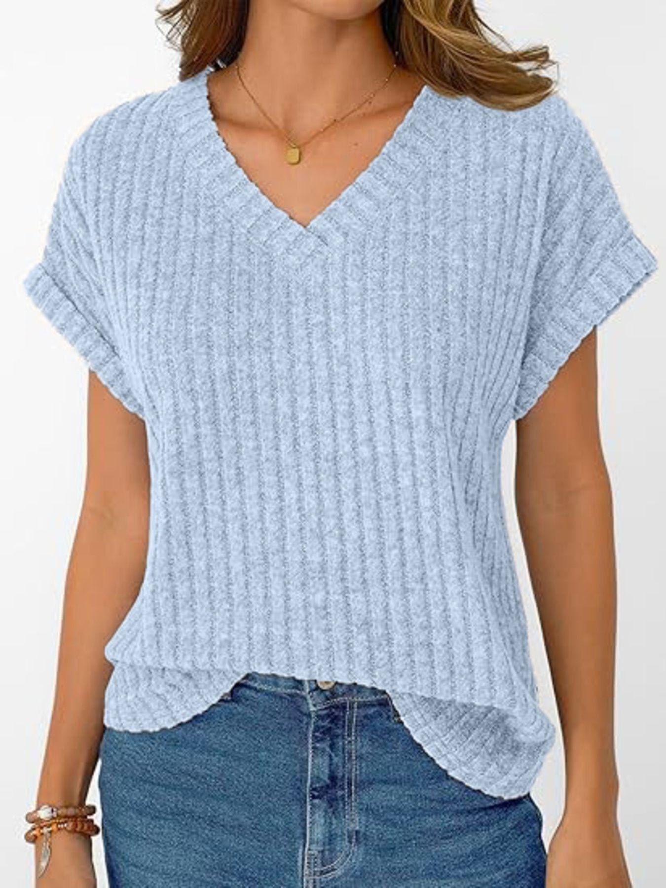 Light blue ribbed v-neck t-shirt with cuffed short sleeves and a relaxed fit.