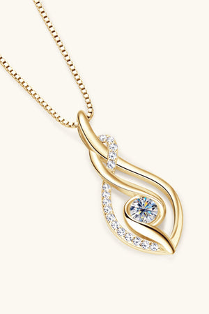 Gold infinity swirl pendant necklace with moissanite and cubic zirconia accents.