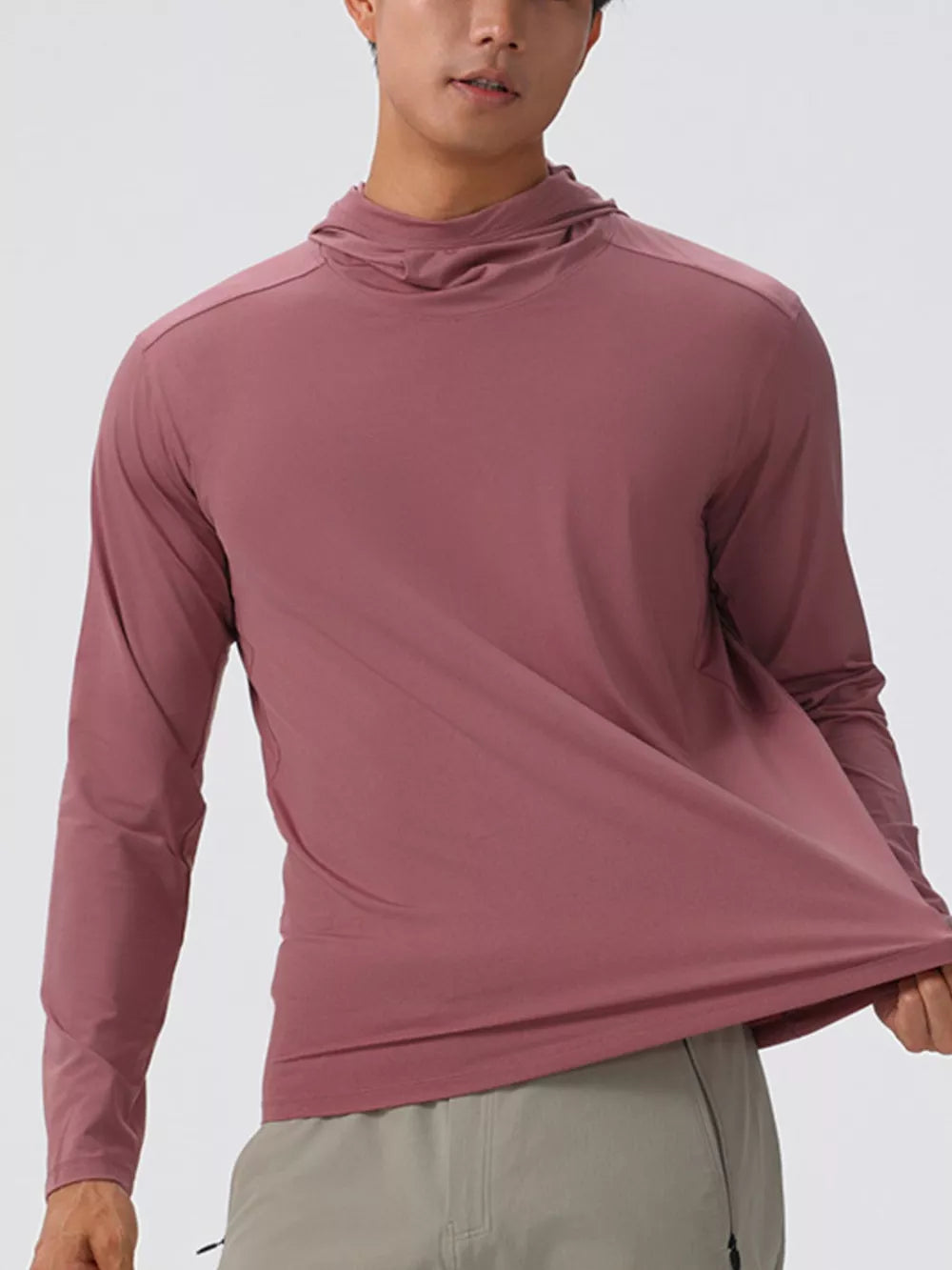 Men's dusty pink long sleeve cotton hoodie with a cowl neck detail.