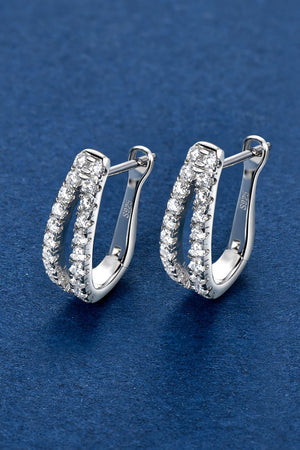 Pavé hoop sterling silver earrings with sparkling cubic zirconia stones.