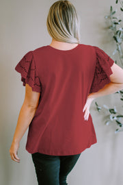 Burgundy eyelet flutter sleeve tee with a crew neck.