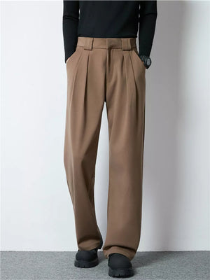 Men's dark brown wide-leg pleated dress pants with a relaxed fit.