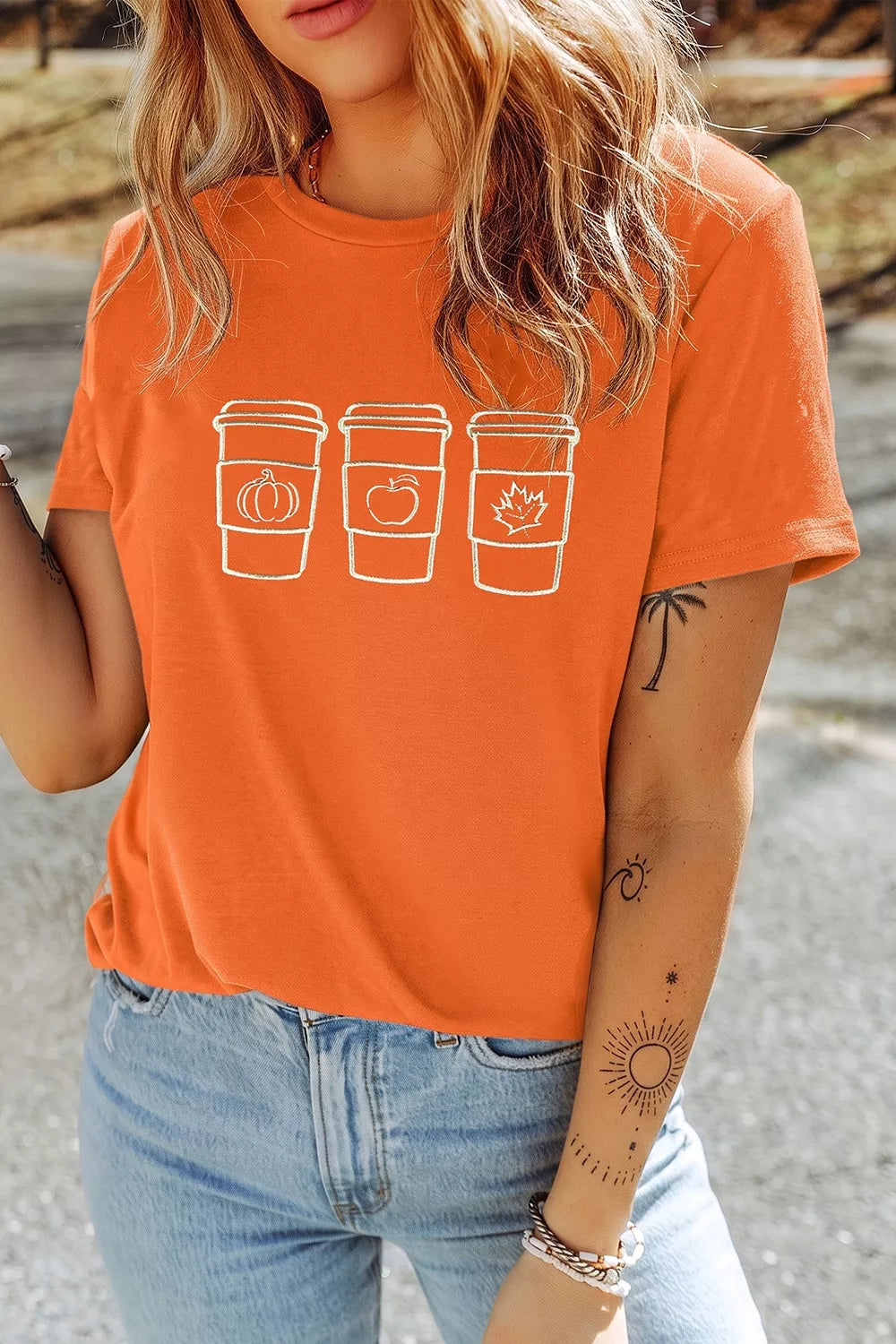 Embroidered Fall Drinks Round Neck Tee in Tangerine, side view