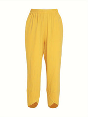 Yellow relaxed fit wide-leg pants with elastic waist and tulip hem detail.