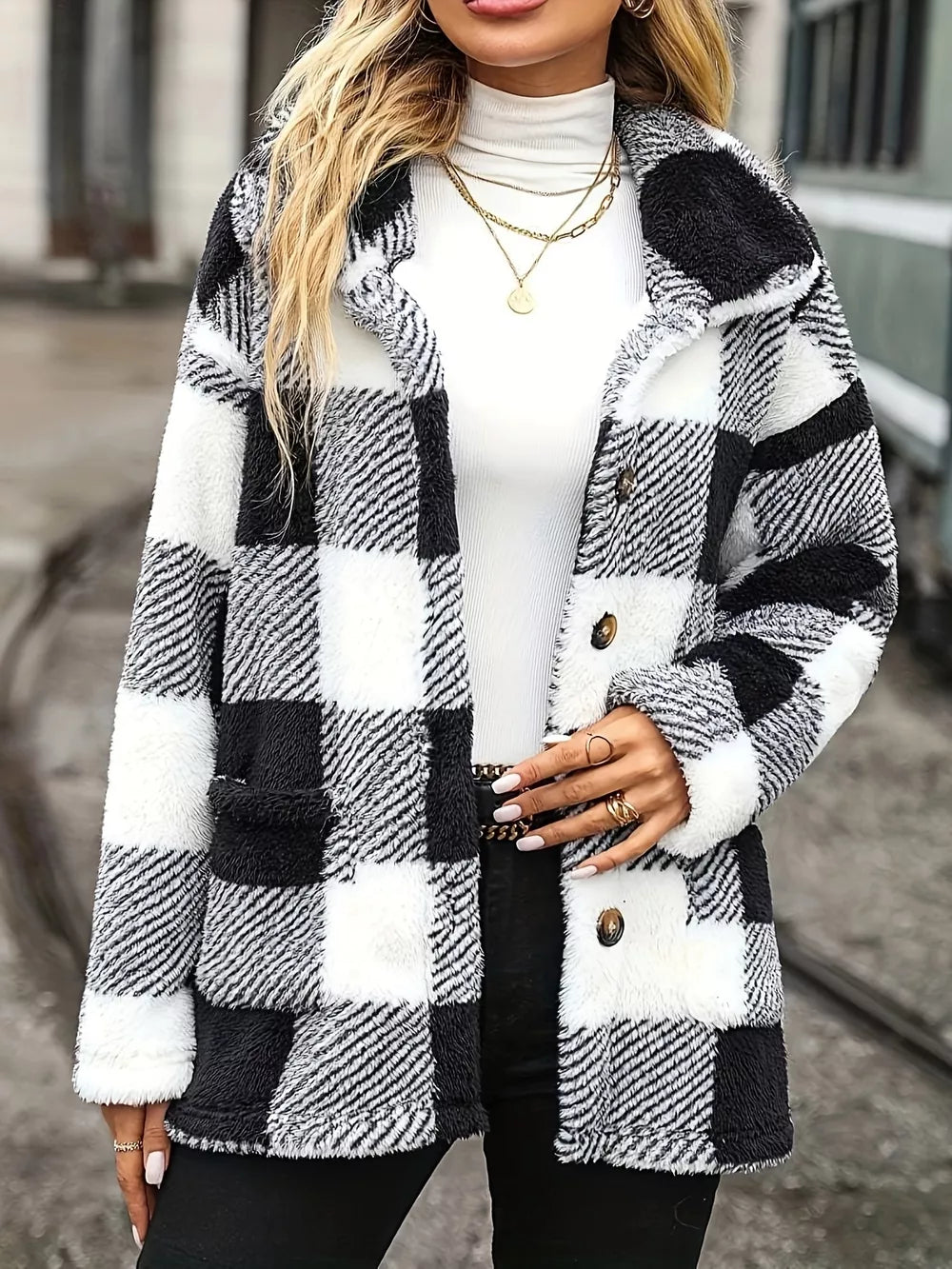 Cozy plaid sherpa trench coat with classic collar and button front.