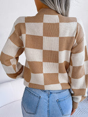 Checkerboard knit mock neck pullover in camel and cream acrylic with long sleeves.