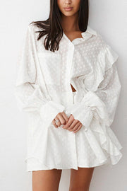 White textured ruffle trim shirt set with collared neckline and balloon sleeves.