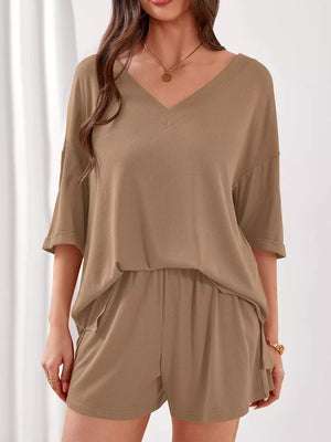 Khaki ribbed V-neck loungewear set with cuffed sleeves and drawstring shorts.