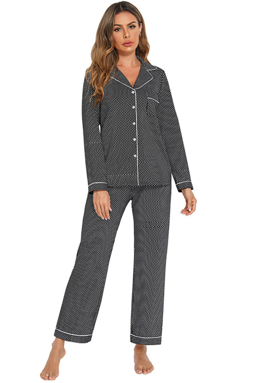 Black polka dot pajama set with white trim and collar.