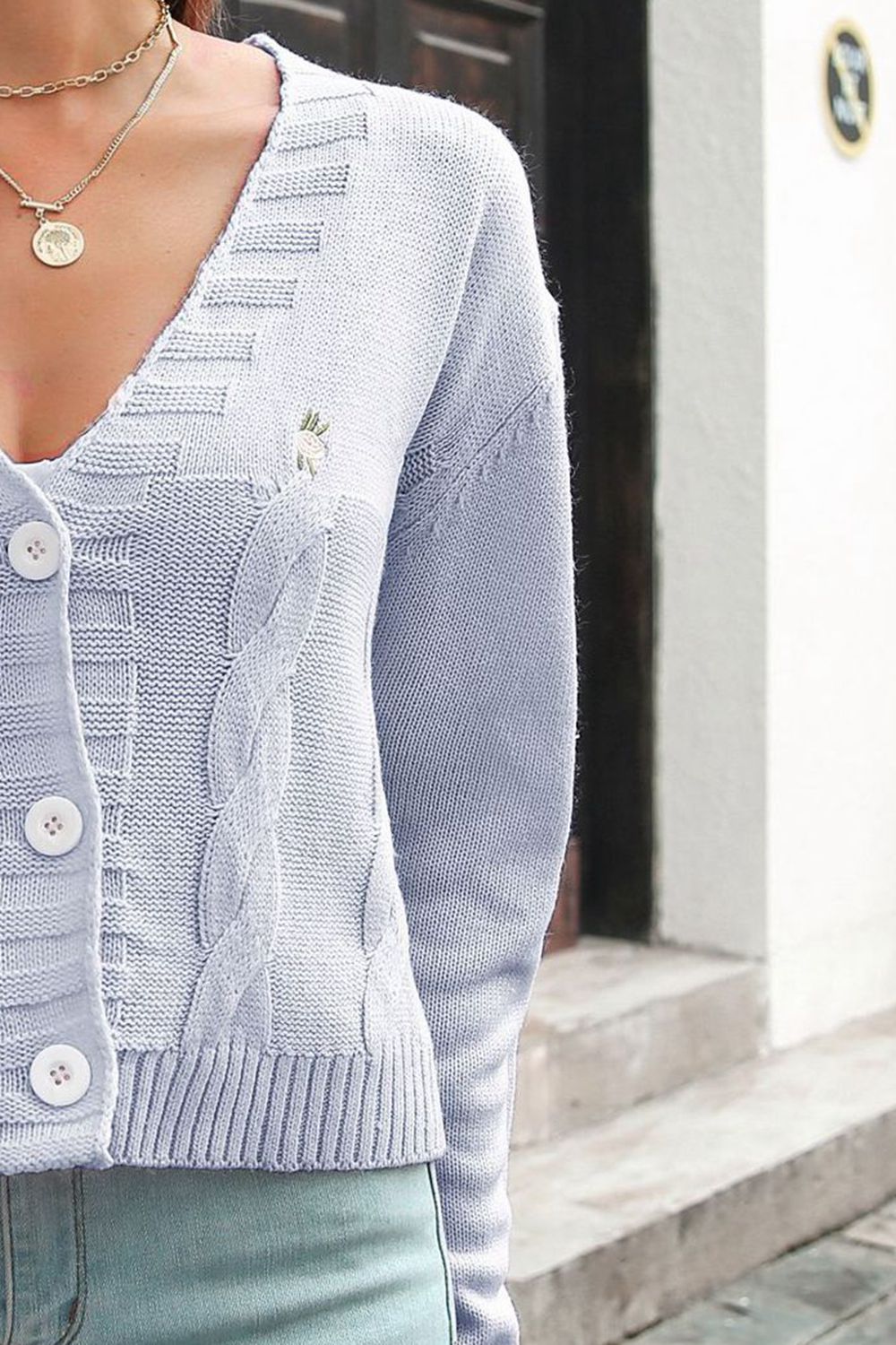 Blue purple cable knit cardigan with embroidered detail and buttons