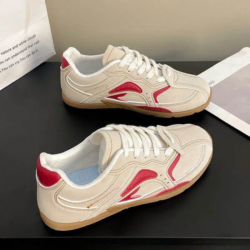 Retro Runner Panel Sneakers in beige with red accents and white laces.