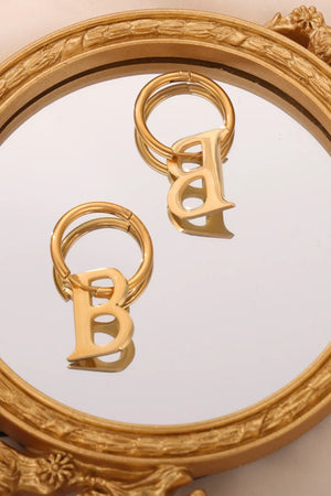 Gold initial letter hoop earrings with B charm