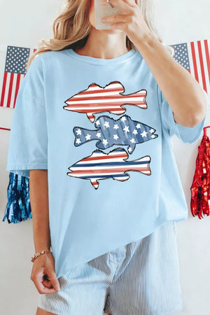Light blue t-shirt with patriotic fish graphic featuring red and white stripes and blue stars.