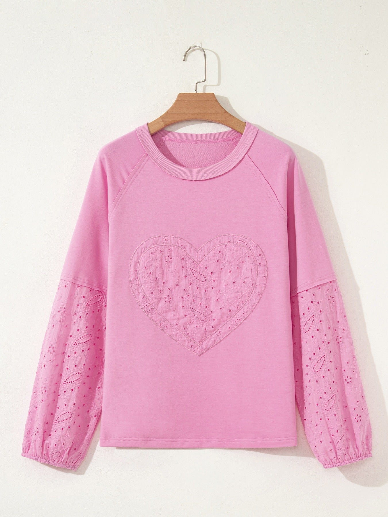 Pink cotton crew-neck sweatshirt with embroidered heart detail and eyelet sleeves