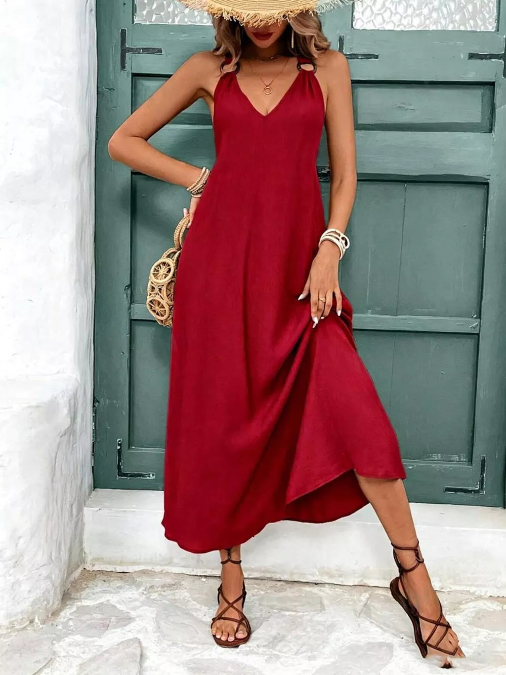 Red halter-detail midi dress with a-line cut and v-neckline.