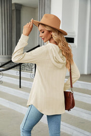 Textured henley hooded tunic in Ivory with long sleeves and a relaxed fit.