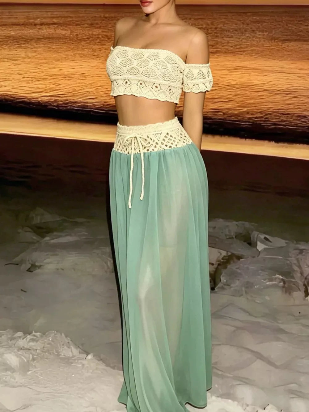 Crochet bandeau top and sheer maxi skirt set in white and pastel blue, off-the-shoulder style