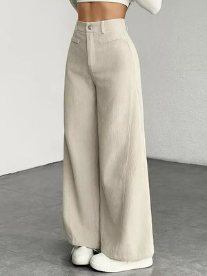Apricot corduroy wide-leg maternity trousers with a high waist and front pockets.