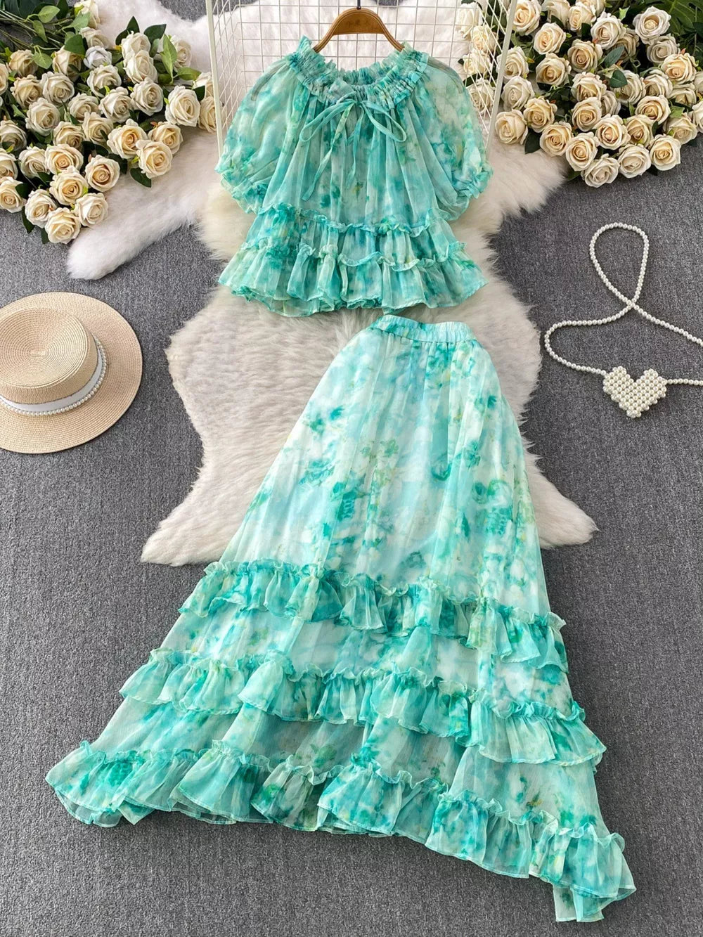 Light green floral ruffle set with bow detail and tiered skirt.
