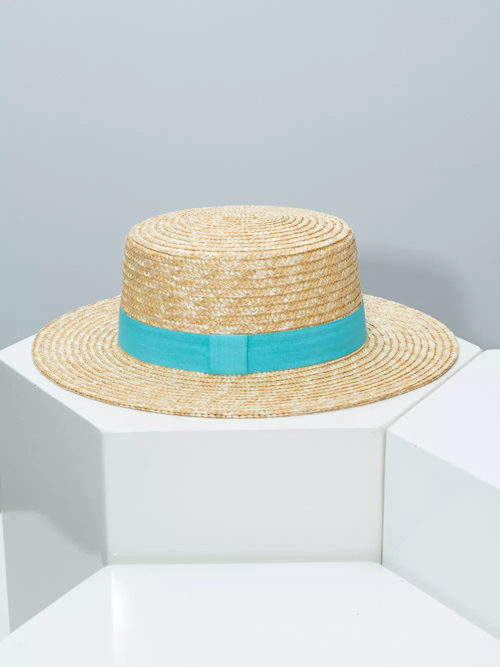 Women's straw boater hat with Lake Blue ribbon band