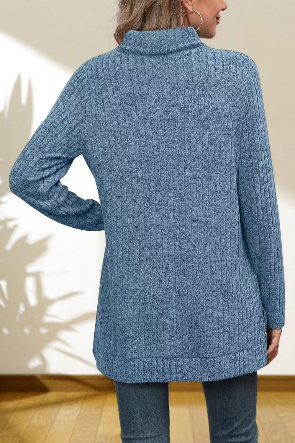 Ribbed knit turtleneck tunic top in Sky Blue with long sleeves and a relaxed fit.