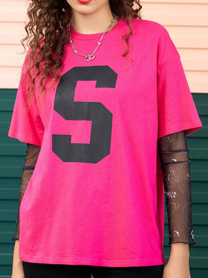 Varsity number tee in bright pink with black mesh sleeves featuring a graphic print.