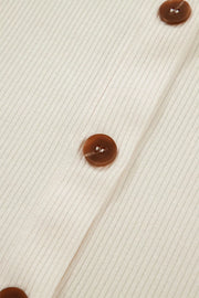 Cream ribbed knit maternity shirt with brown button details