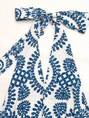 Blue and white medallion print halter maxi dress with a tie neck.
