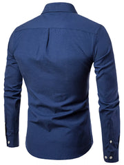 Navy blue cotton button-down shirt with long sleeves and back pleats.