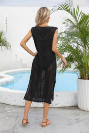Black crochet midi cover-up dress with geometric pattern and side slits.