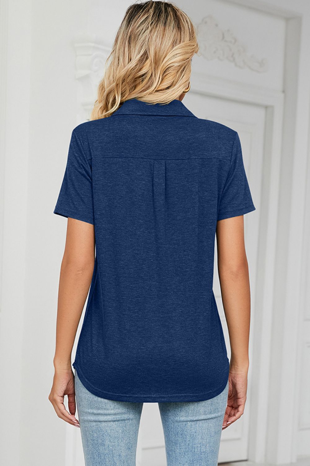 Dark Blue V-neck polo tee with short sleeves and a back yoke detail.