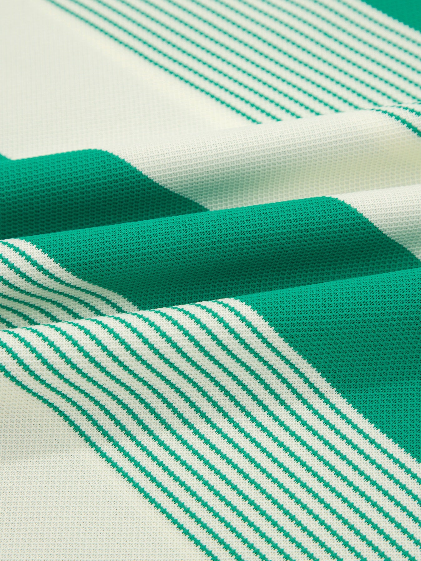 Green and white striped t-shirt with cap sleeves and crew neck