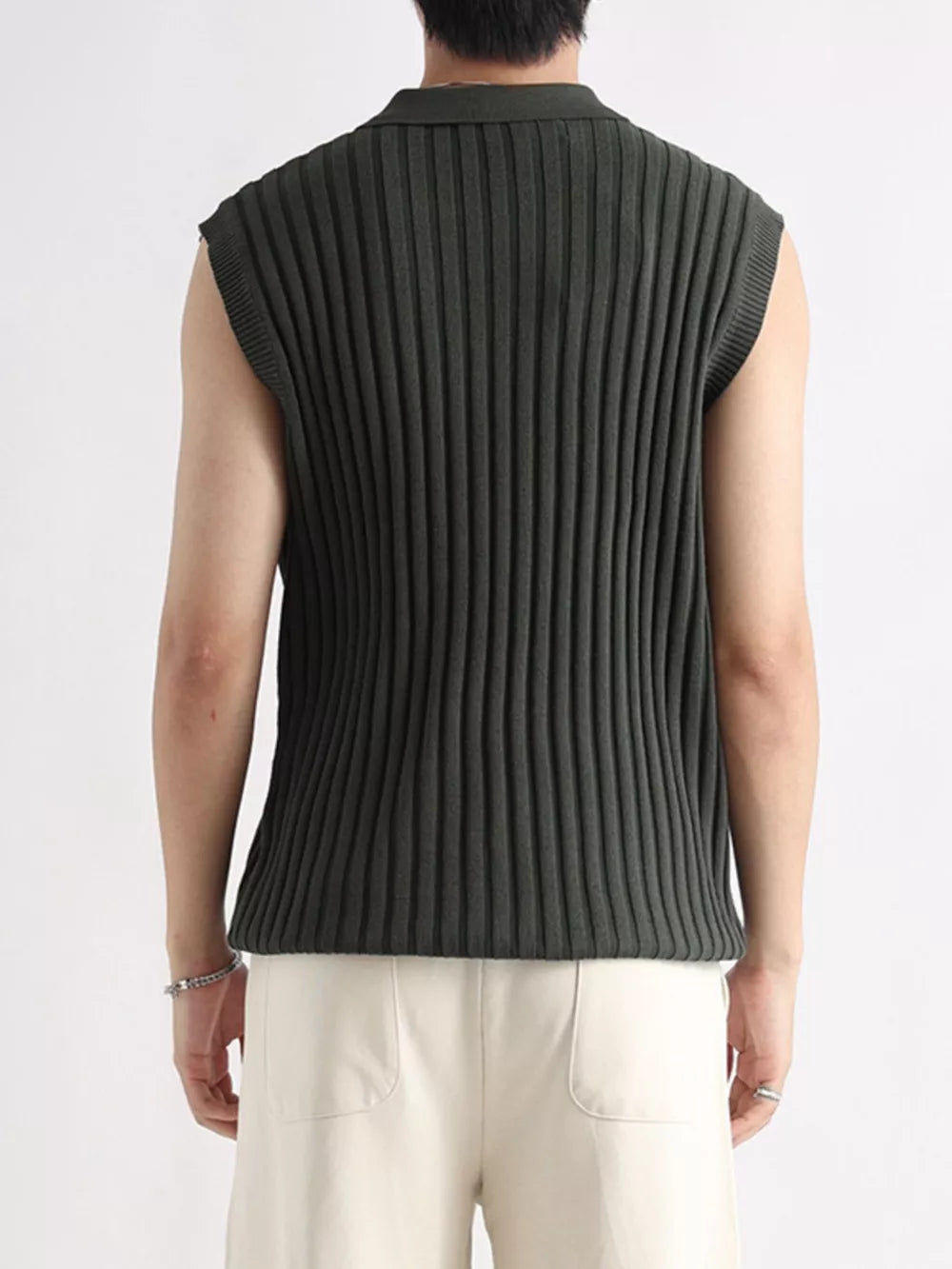 Men's ribbed knit zip-up tank in dark green with a polo collar.
