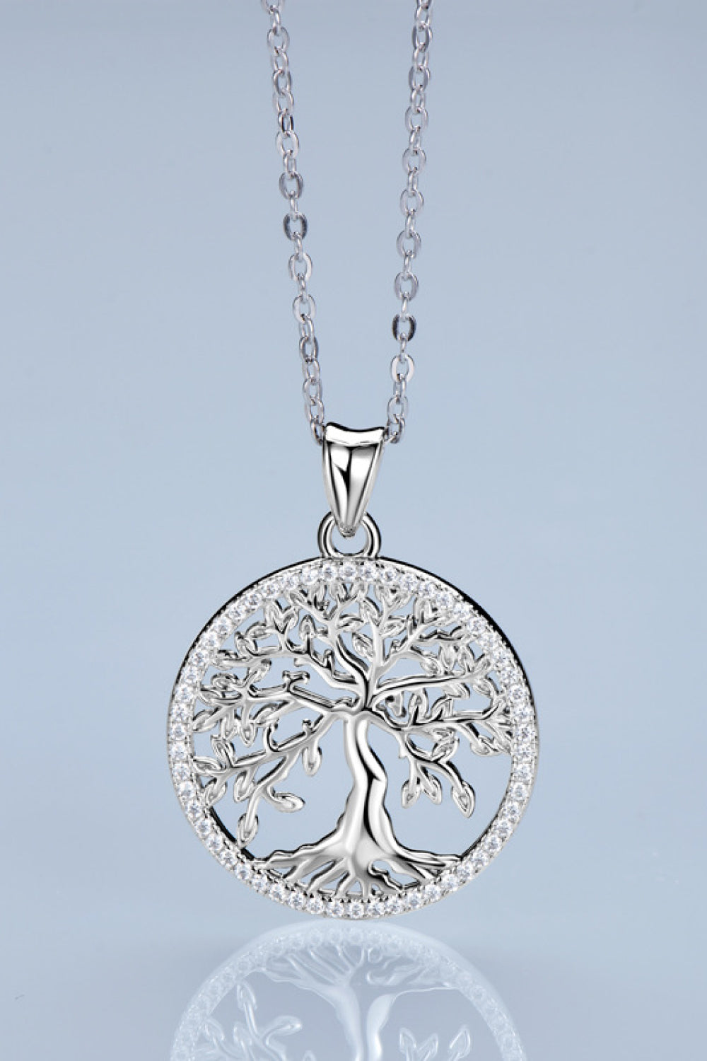 Sterling silver necklace with a circular Tree of Life pendant and crystal accents.