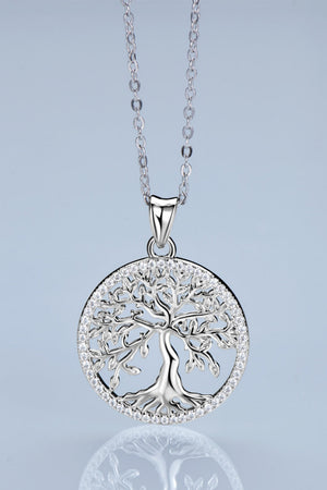 Sterling silver necklace with a circular Tree of Life pendant and crystal accents.