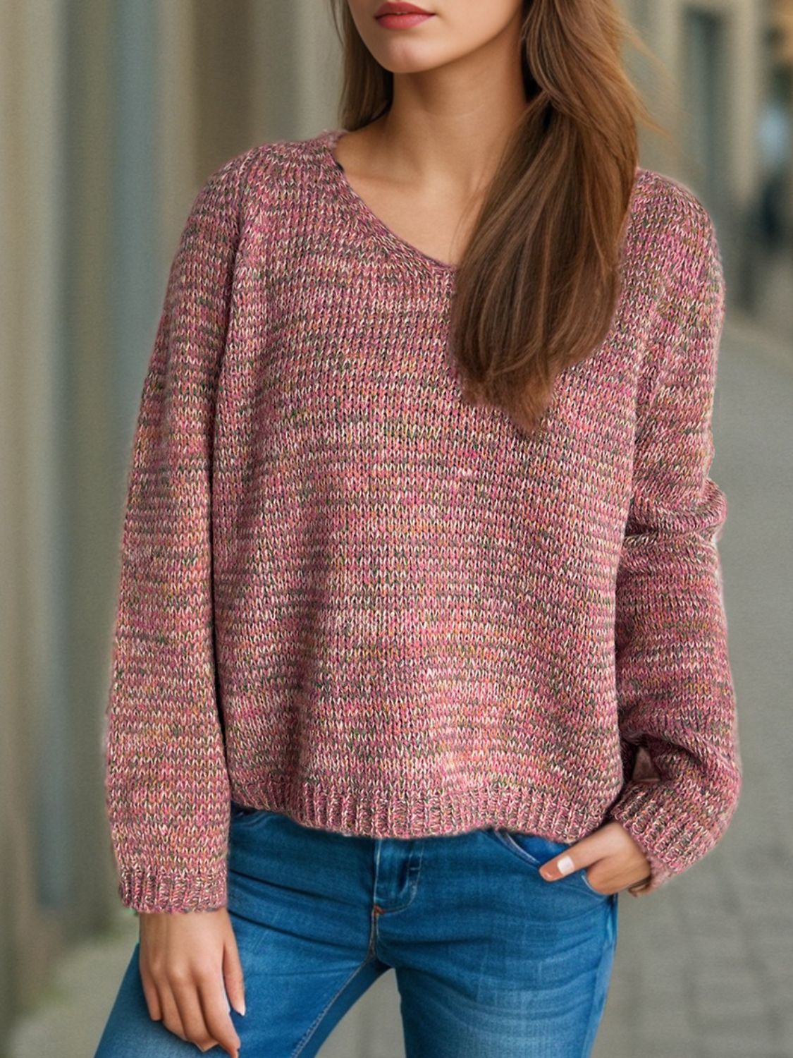 Textured slouch v-neck sweater in dusty pink with multi-color flecks, acrylic knit.