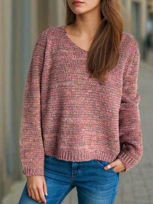 Textured slouch v-neck sweater in dusty pink with multi-color flecks, acrylic knit.