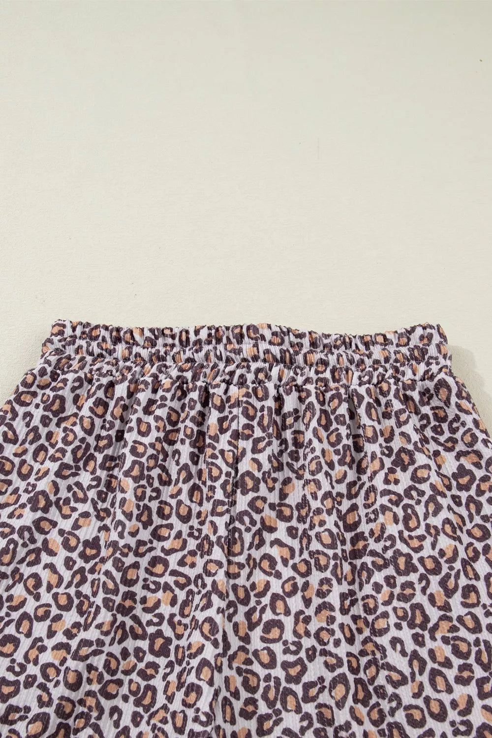 Leopard print ribbed loungewear set with drawstring waist detail.